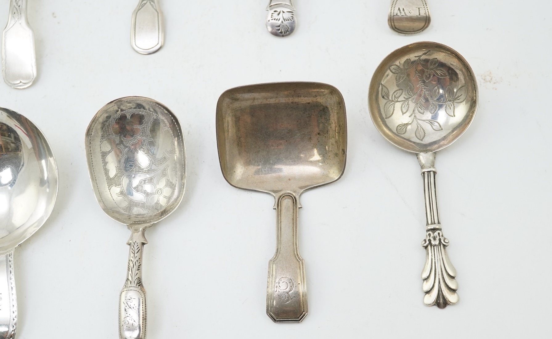 Ten assorted manly 19th century silver caddy spoons